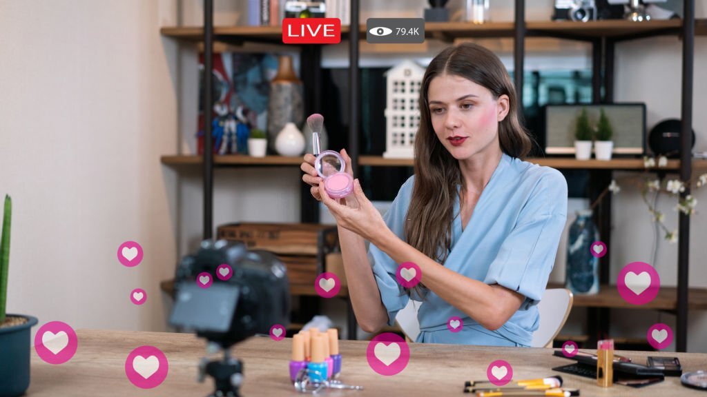 Woman does makeup while recording live stream with video player interface